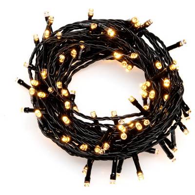 Coiled string of warm white LED fairy lights on a white background.