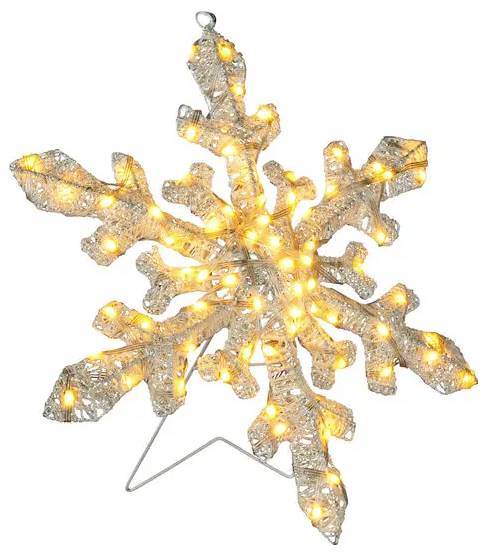 Lit decorative snowflake ornament with warm white lights on a stand against a white background.