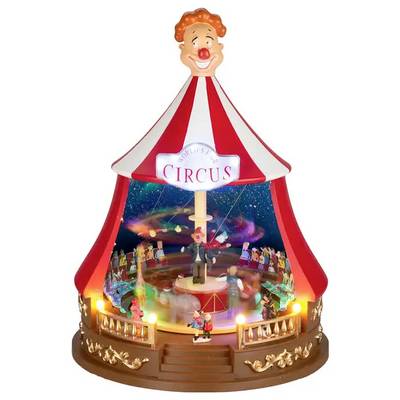 Decorative circus tent music box with clown head topper, glowing lights, and tiny performers on a stage labeled 'CIRCUS'.