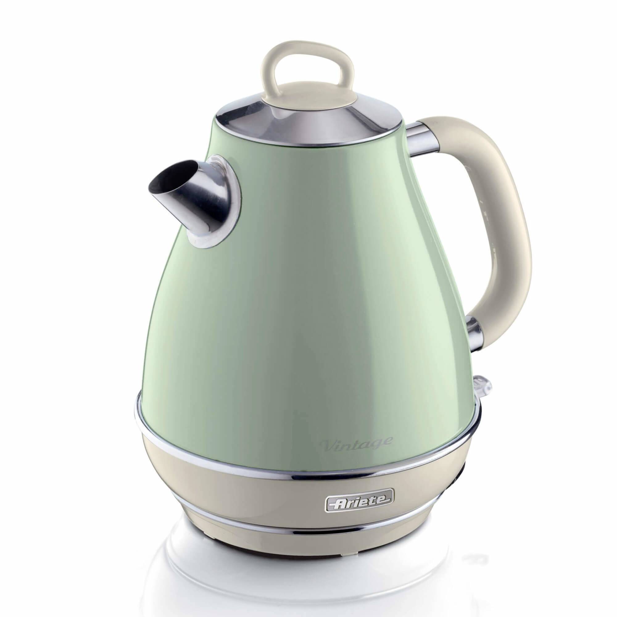 Mint green vintage-style electric kettle with beige handle and base, shown on a white background.<br>