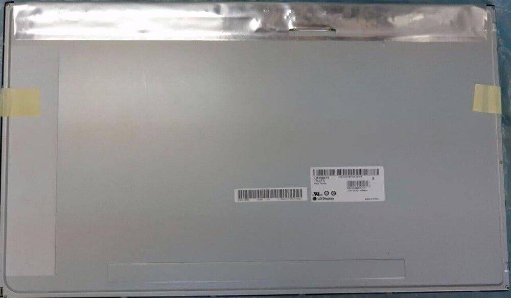 Back of a silver laptop lid, showing a barcode label and small certification sticker near the lower right.