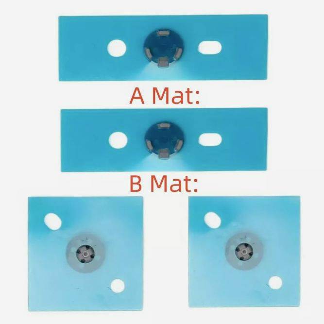 Comparison image of blue mats labeled 'A Mat' and 'B Mat', showing different cutout and hole placements around a central circular fixture.
