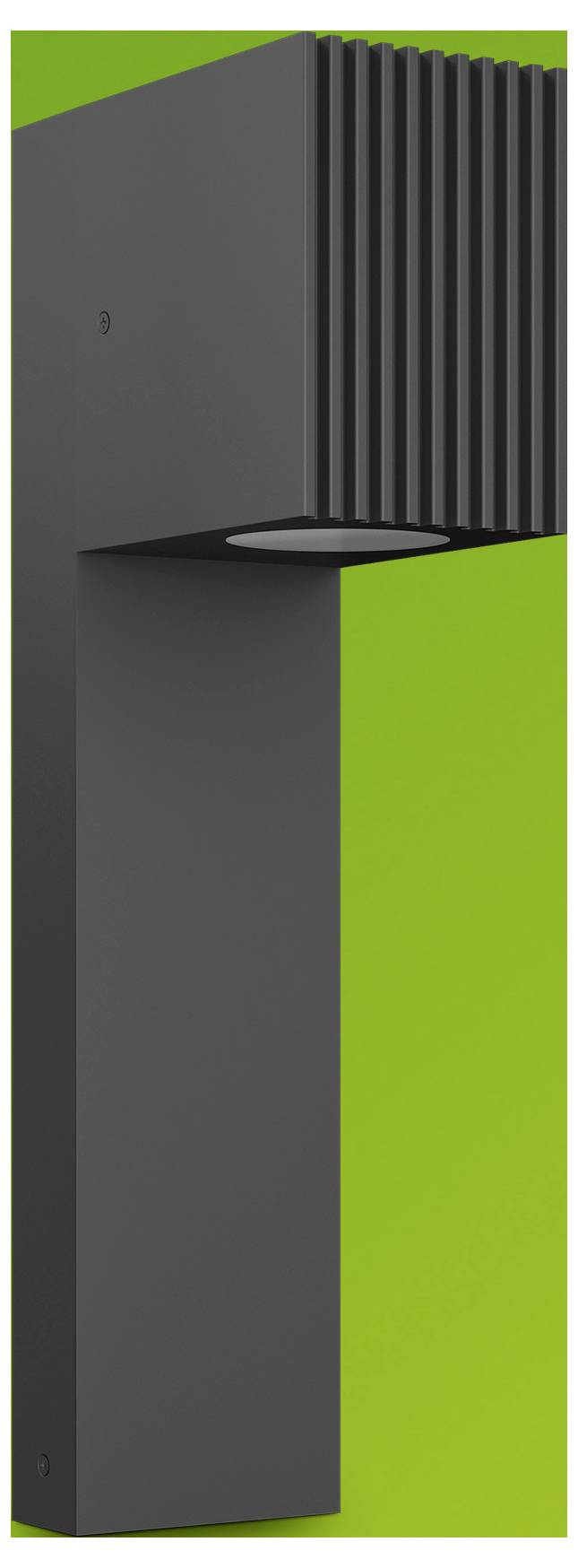 Dark gray modern wall sconce with vertical ribbed top and flat rectangular body on a bright green background.