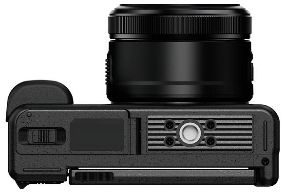 Bottom view of a black digital camera with attached lens, showing the battery compartment, tripod mount, and ribbed grip panel.<br>