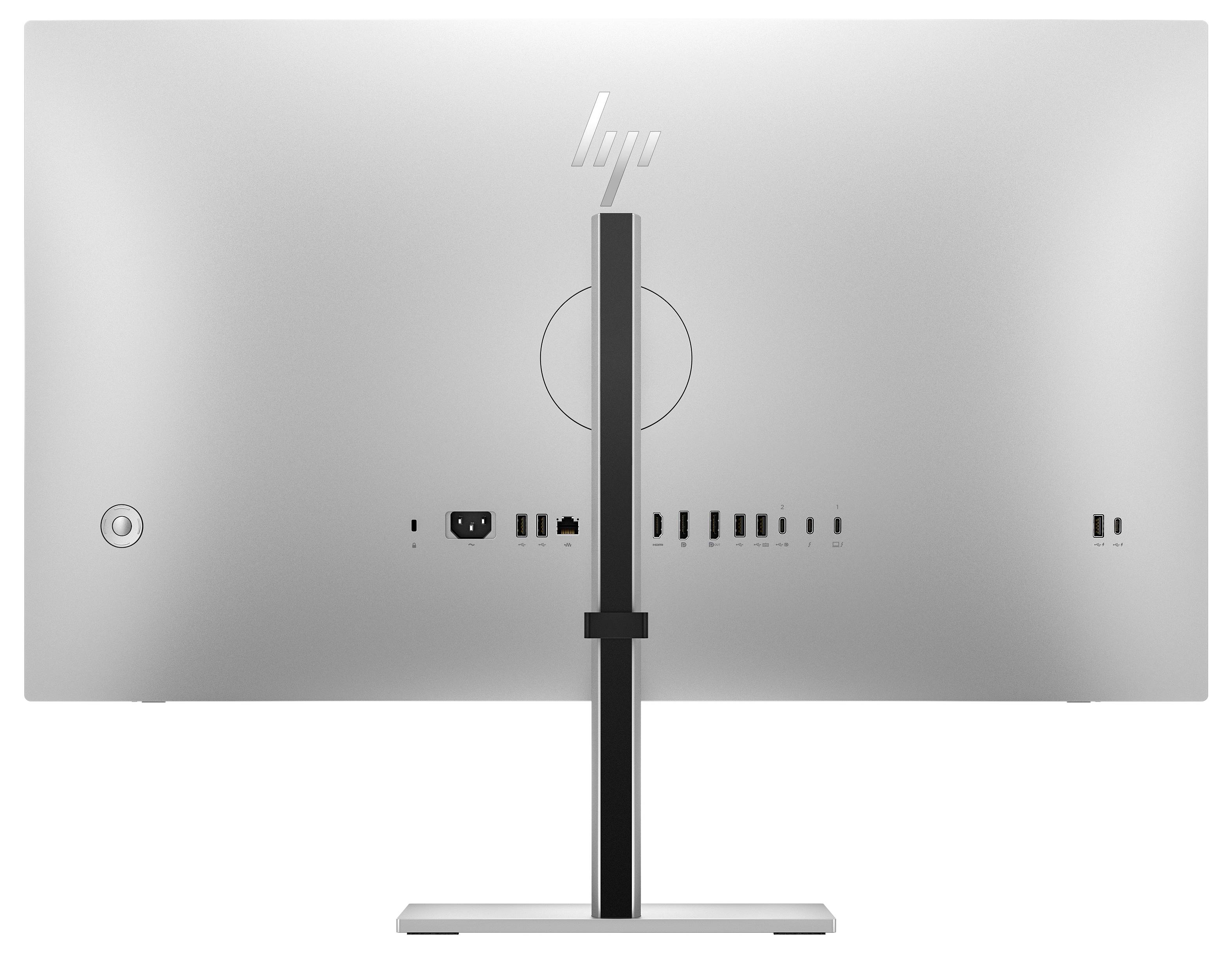 Rear view of a silver HP monitor on a stand, showing the back panel ports and central mount<br>