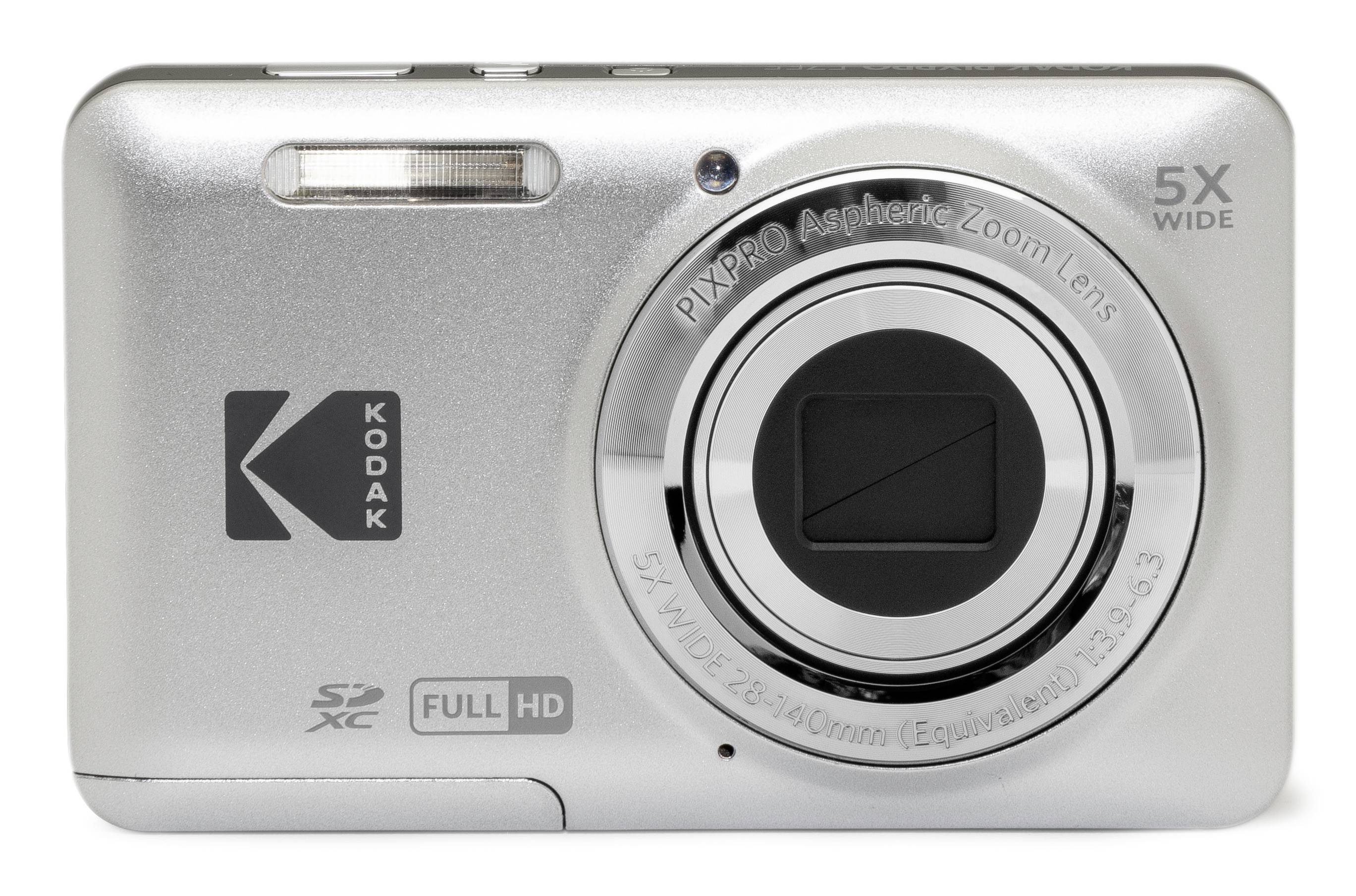 Silver Kodak compact digital camera front view with lens, flash, and 5x wide zoom markings.<br>