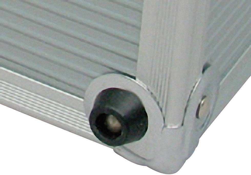 A silver suitcase with a black plastic corner, detailed view of a robust metal construction.