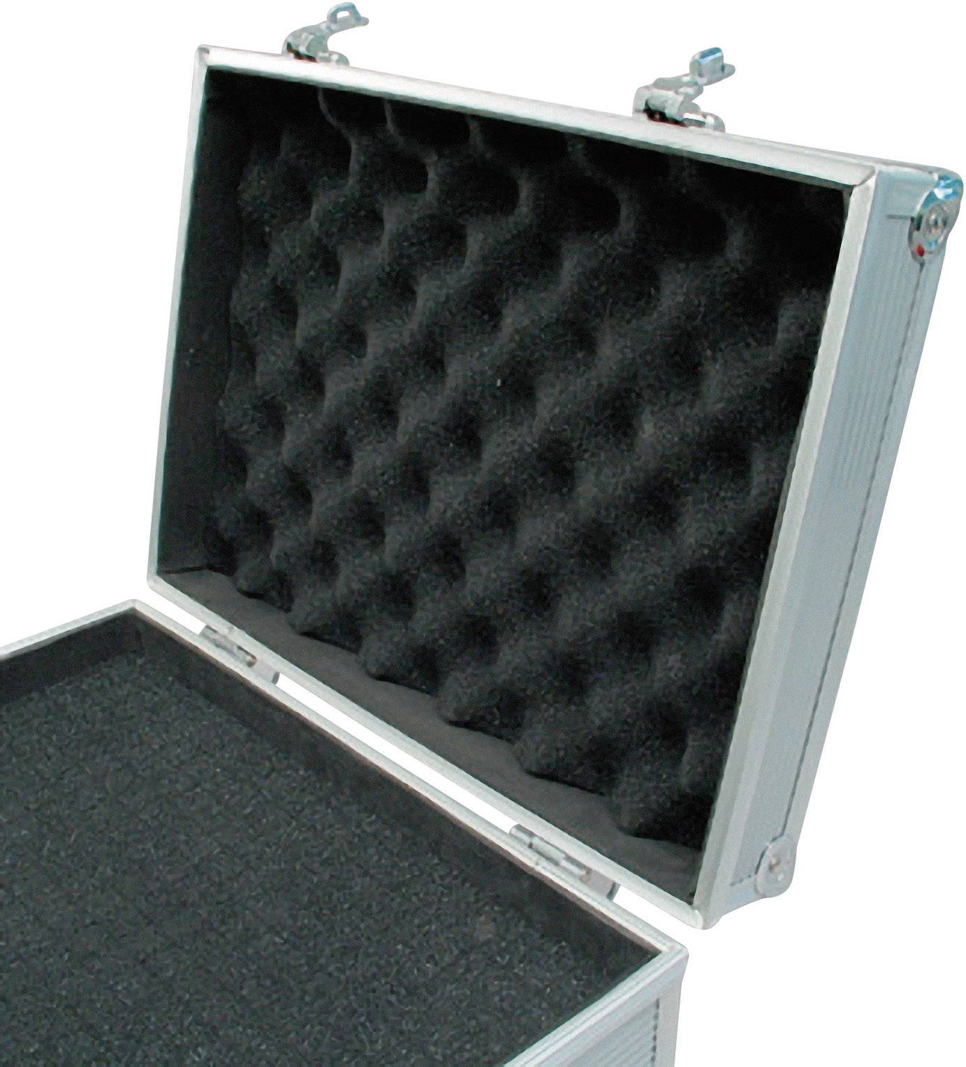 An open silver suitcase with black foam interior lining to protect its contents.