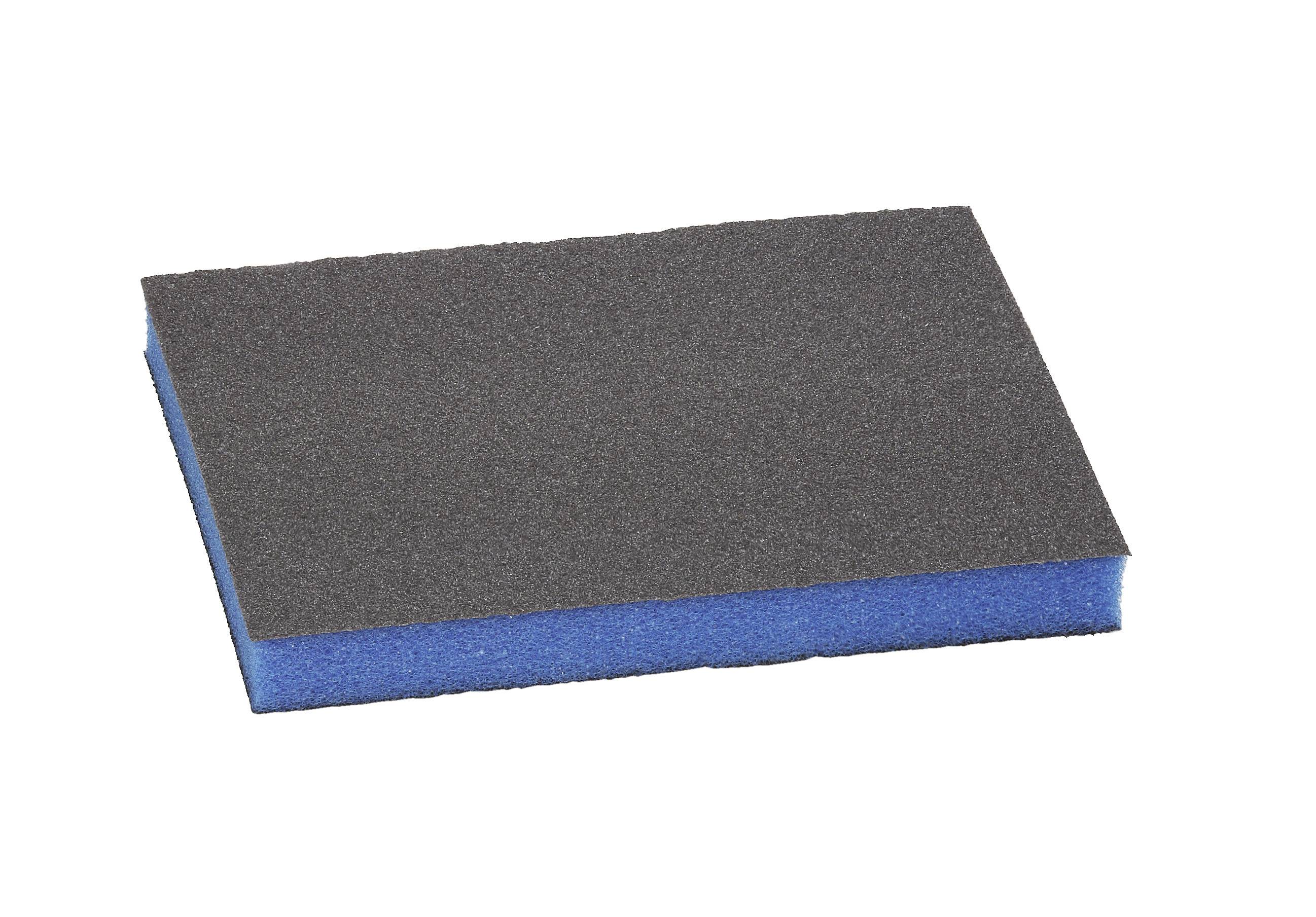 A rectangular, two-coloured cleaning sponge with a blue underside and black top side lies on a white background.