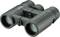 Green binoculars with a black central bridge and rubberised surface, suitable for outdoor activities such as birdwatching.