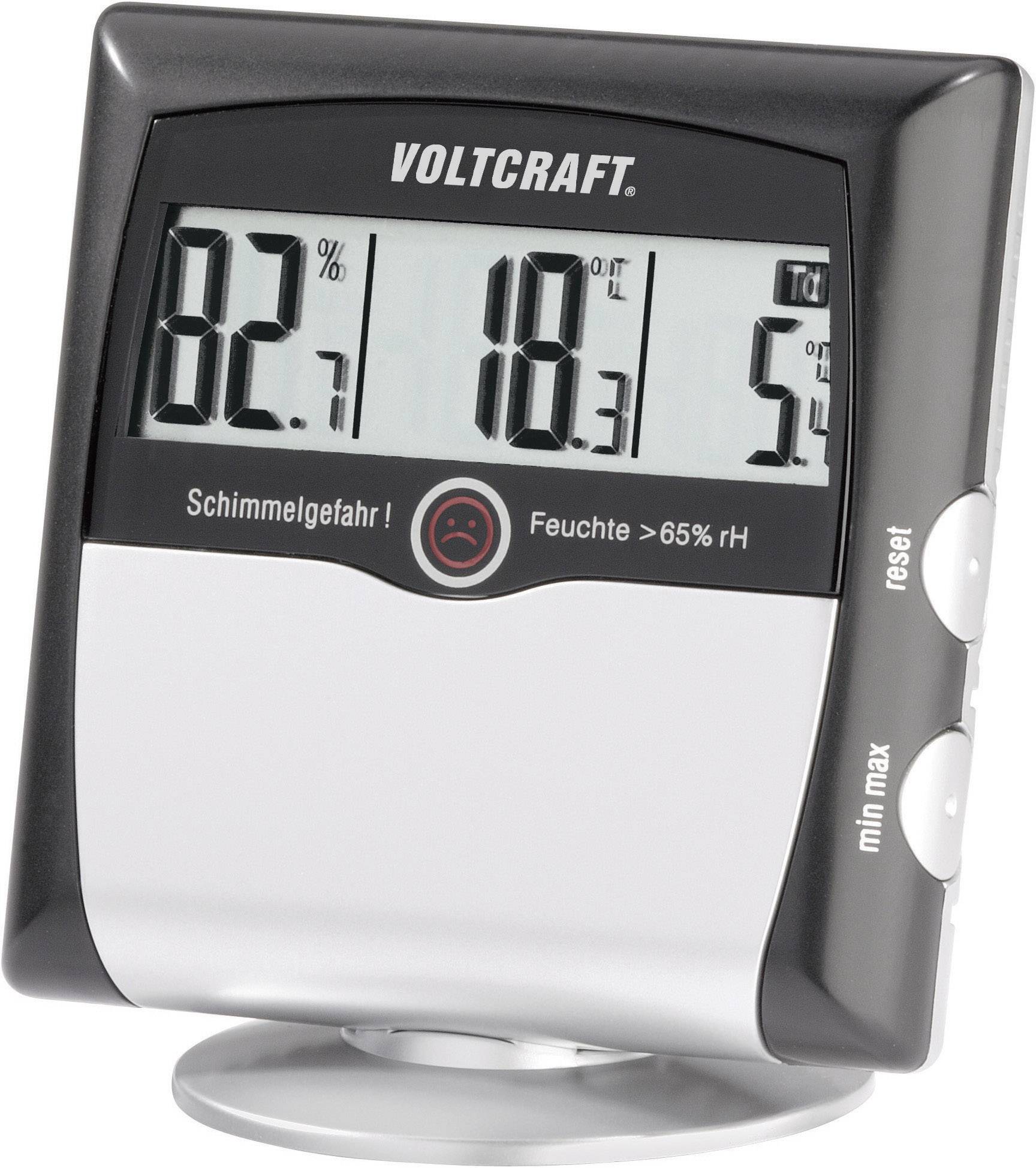 A digital hygrometer shows a humidity level of 82%, a temperature of 18°C and a warning symbol for mould risk.