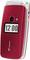 Red flip mobile phone with external display showing '12:00'. Camera and flash are located above the display.
