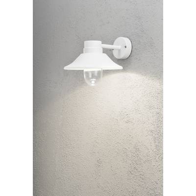 White wall light with a simple design illuminates a grey wall. Softly lights the area beneath it.