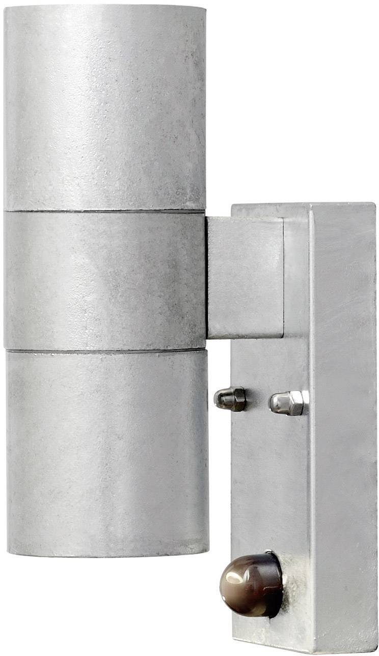 Silver cylindrical wall bracket with electrical connections; used for mounting and connecting devices to walls.