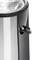 Electric coffee grinder in black and silver metal, showing the switch on the side.