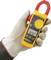 Measuring device in a gloved hand shows 3250 A direct current. The device is yellow with a red grip.