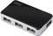 Black USB hub with four ports and a blue LED indicator on the top surface.