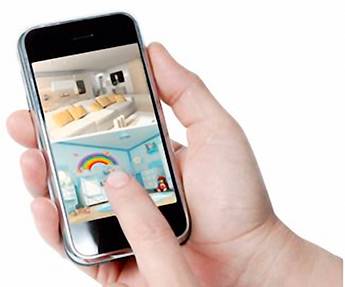 A hand is holding a smartphone displaying an interior photo with sofas and a colourful picture with a rainbow.