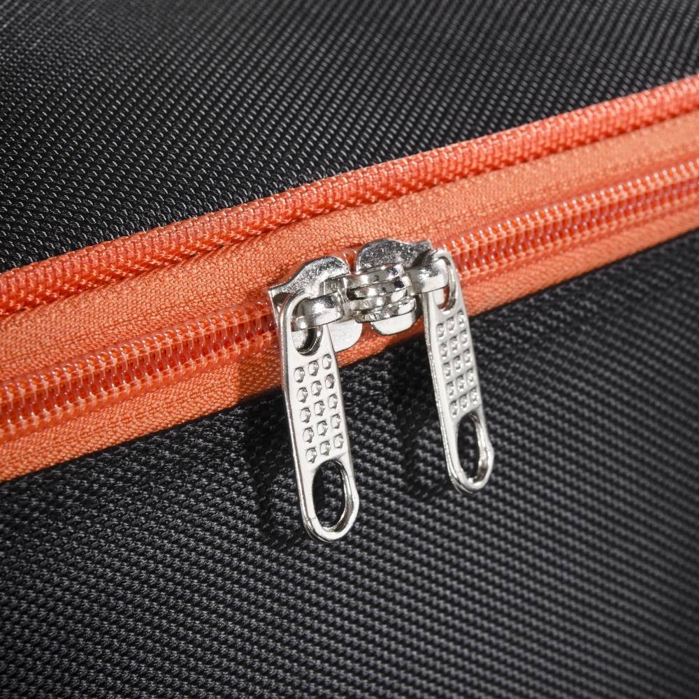 Black bag with orange zip and two metallic pull tabs.