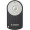Black remote control transmitter with silver button and Canon logo. Suitable for wireless camera control.