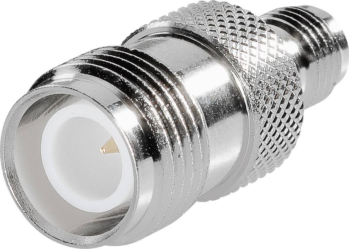 Metal coaxial plug with knurled grip and threaded end, suitable for high-frequency applications.