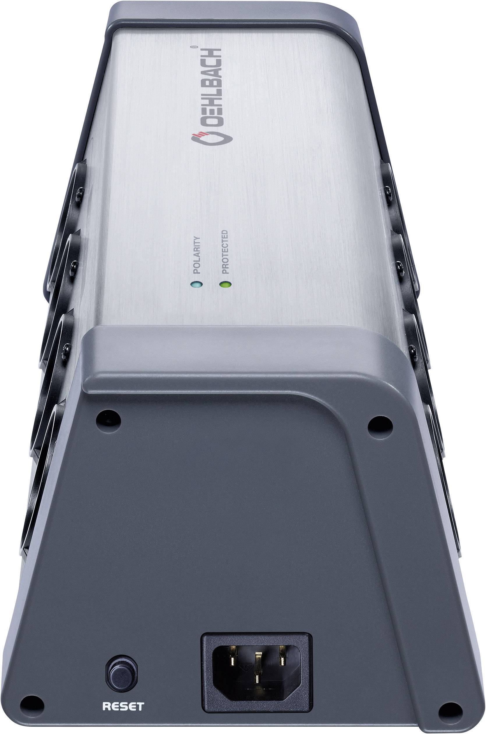 A grey, triangular electrical device with 'Oehlbach' printed on it. It has a reset button and multiple power connections.