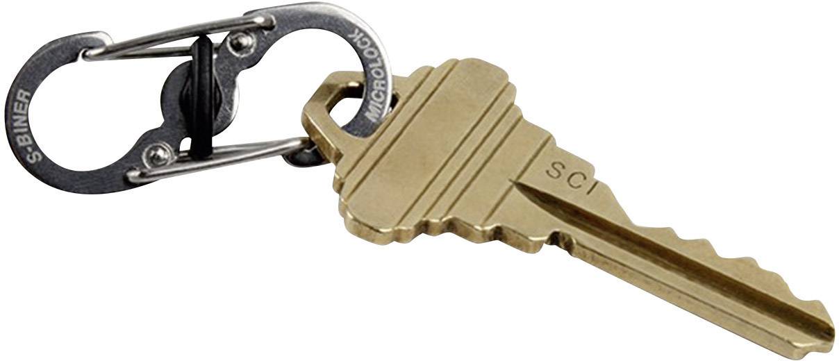 Brass-coloured key with 'SCI' engraving, attached to a silver carabiner with S-biner mechanism; for key storage.