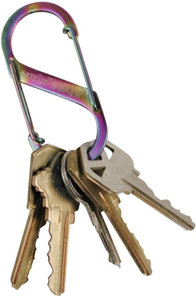 A colourful carabiner clip holds together several silver and golden keys.