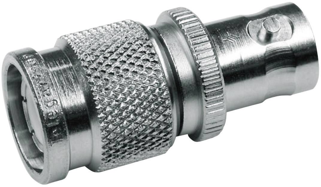A silver BNC plug with a ribbed surface for secure connection of coaxial cables in electronic devices.