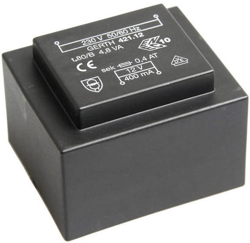 'Black electric transformer with technical specifications on the top surface: 230 V, 50/60 Hz, 12 V output.'