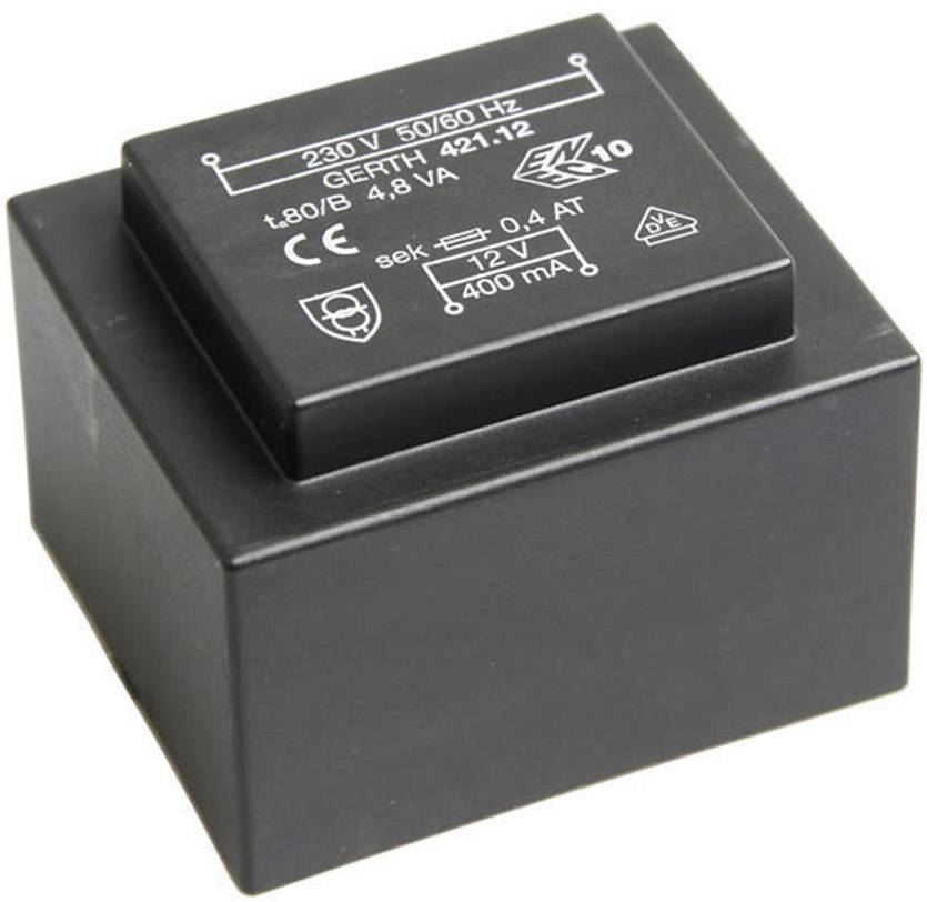 A black transformer with inscription: '230 V 50/60 Hz', '10', '12 V'. Shows technical specifications and safety symbols.