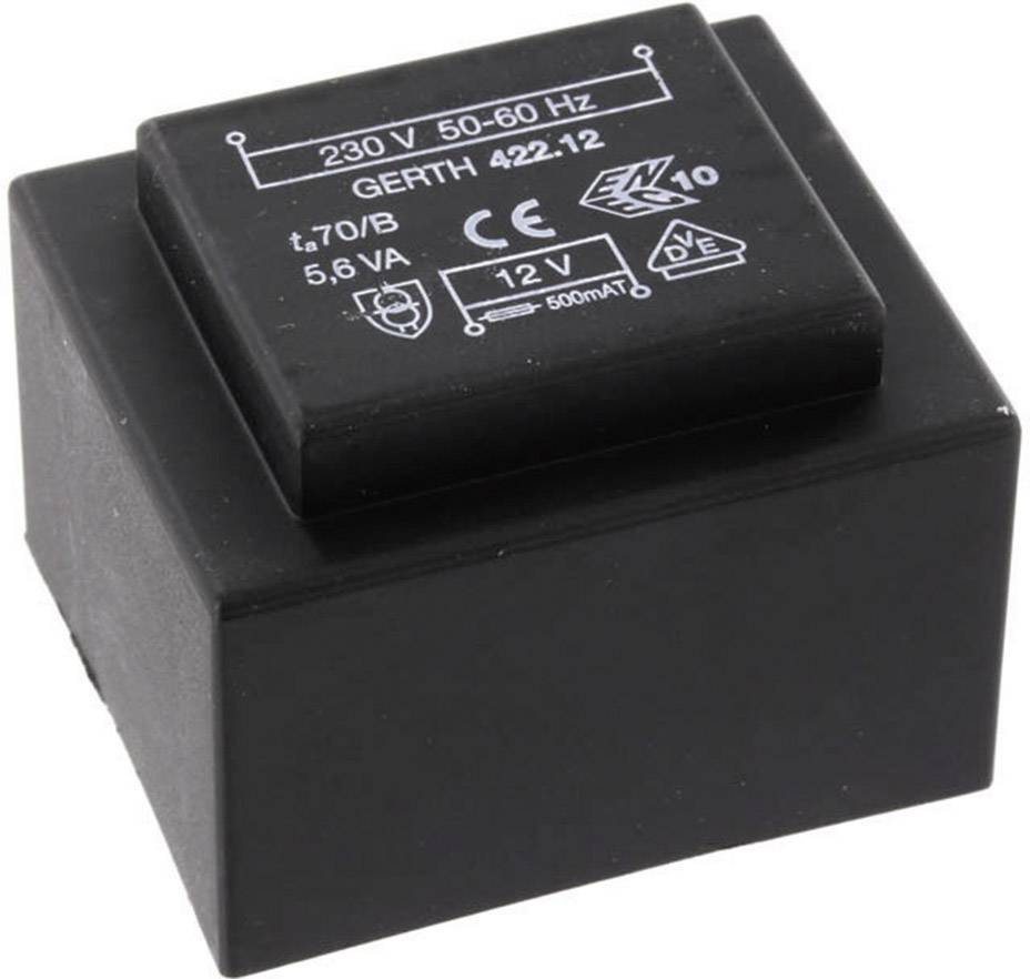 A black electronic transformer with the specifications '230 V, 50-60 Hz, 5.6 VA, 12 V, 500 mA' on the top surface.
