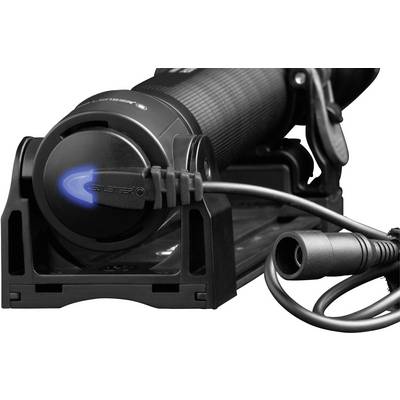 A portable electrician's fork with a black housing and blue light, connected by a cable, mounted on a stand.