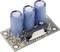 Three blue cylindrical capacitors on an electronic circuit board, connected with multiple pins used for voltage regulation.