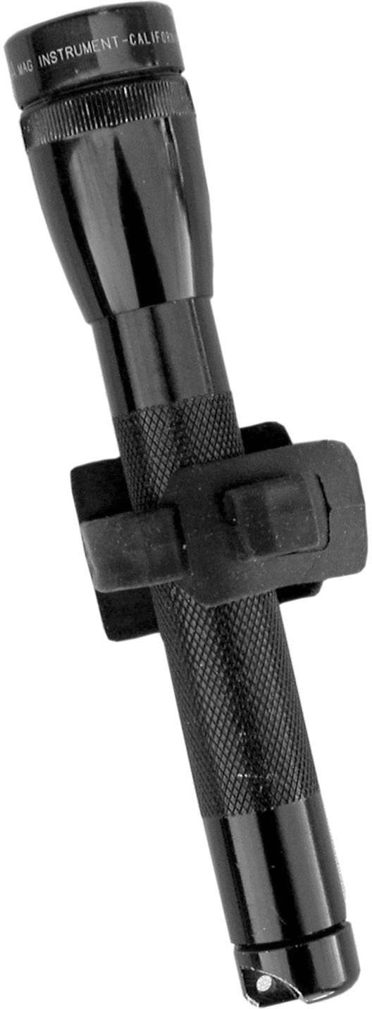 A black torch with a textured grip, secured to a clip holder.