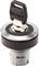 A security key is inserted into a silver circular lock.