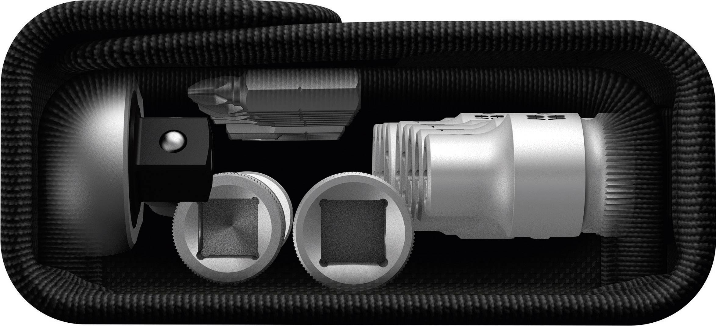 A casing containing a silver, cylindrical device and two small, square objects. All components are securely packaged.