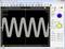 Oscilloscope screen shows a sine wave with an amplitude of 500 mV. The time base is set to 500 µs.