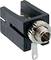 Socketed TO-5 transistor mount with a round metal clip and black plastic casing, suitable for electronic applications.