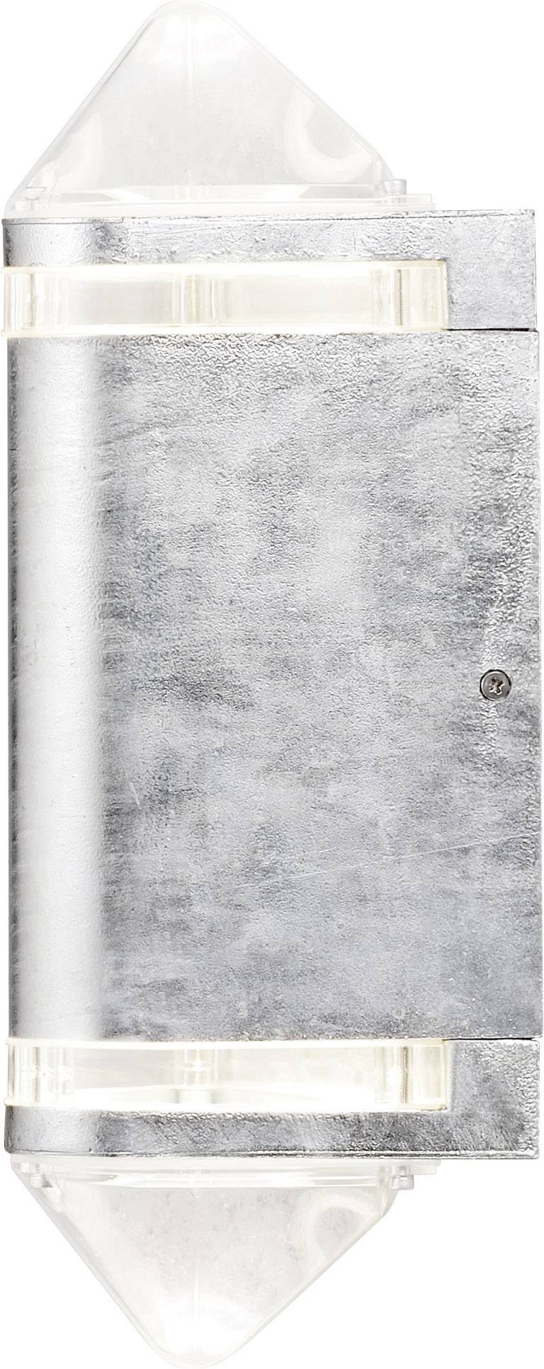 Wall light with a modern, metallic design, illuminating upwards and downwards. Ideal for mood or accent lighting.