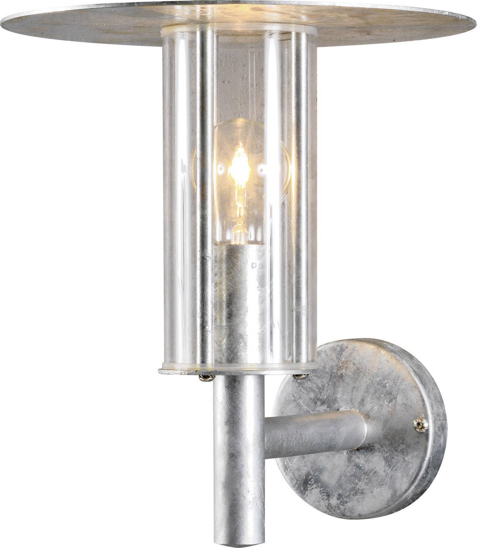 A metal wall light with a cylindrical, transparent glass casing and a visible illuminated light bulb.