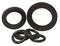 Rubber sealing rings in various sizes, unused, on a white background.
