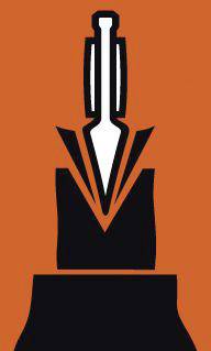 A black fountain pen stands vertically on an orange background and symbolises creativity or the art of writing.