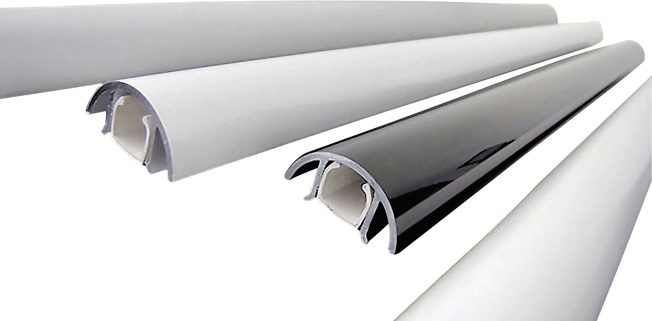 Four elongated, curved coverings made of plastic or metal in various colours lie side by side.