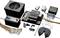 An electronics kit with a speaker, microcontroller unit, cables, and connectors, for controlling robotics components.