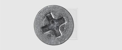 'Top view of a Phillips head screw on a grey background.'