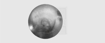 A metallic round head of a nail or bolt on a grey background.