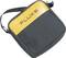 Black and yellow carrier bag with 'FLUKE' printed on the front, with a diagonal shoulder strap.