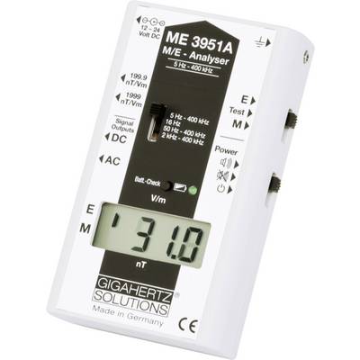 Portable electromagnetic field measurement device, displaying '31.0 V/m'. Manufacturer: Gigahertz Solutions, Model ME 3951A.