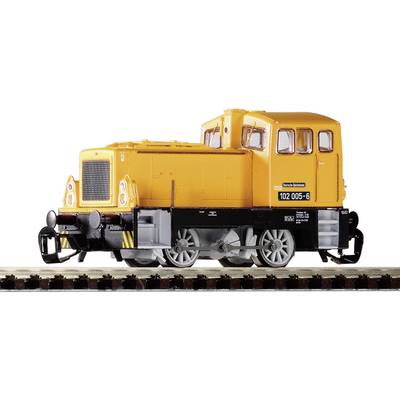 A yellow model of a diesel locomotive on a track, with the inscription '102 005-6'.